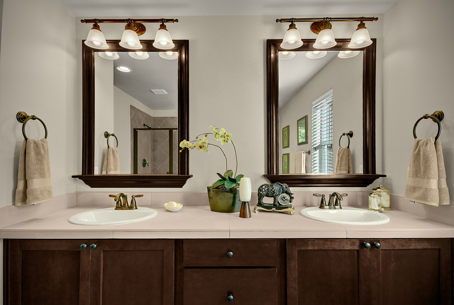 Bronze Lamps Over Bathroom Double Vanity