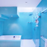 Blue Bathroom Design with White Tub