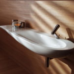 Long and Narrow Sink on Wood Paneled Wall