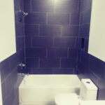 Large Black Tiles Bathroom